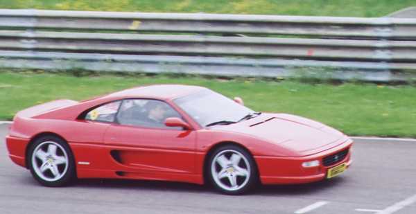 Caroline on the racetrack at Thruxton in a left hand drive Ferrari 355