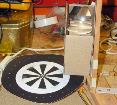 Mounted disk with early open viewing tower